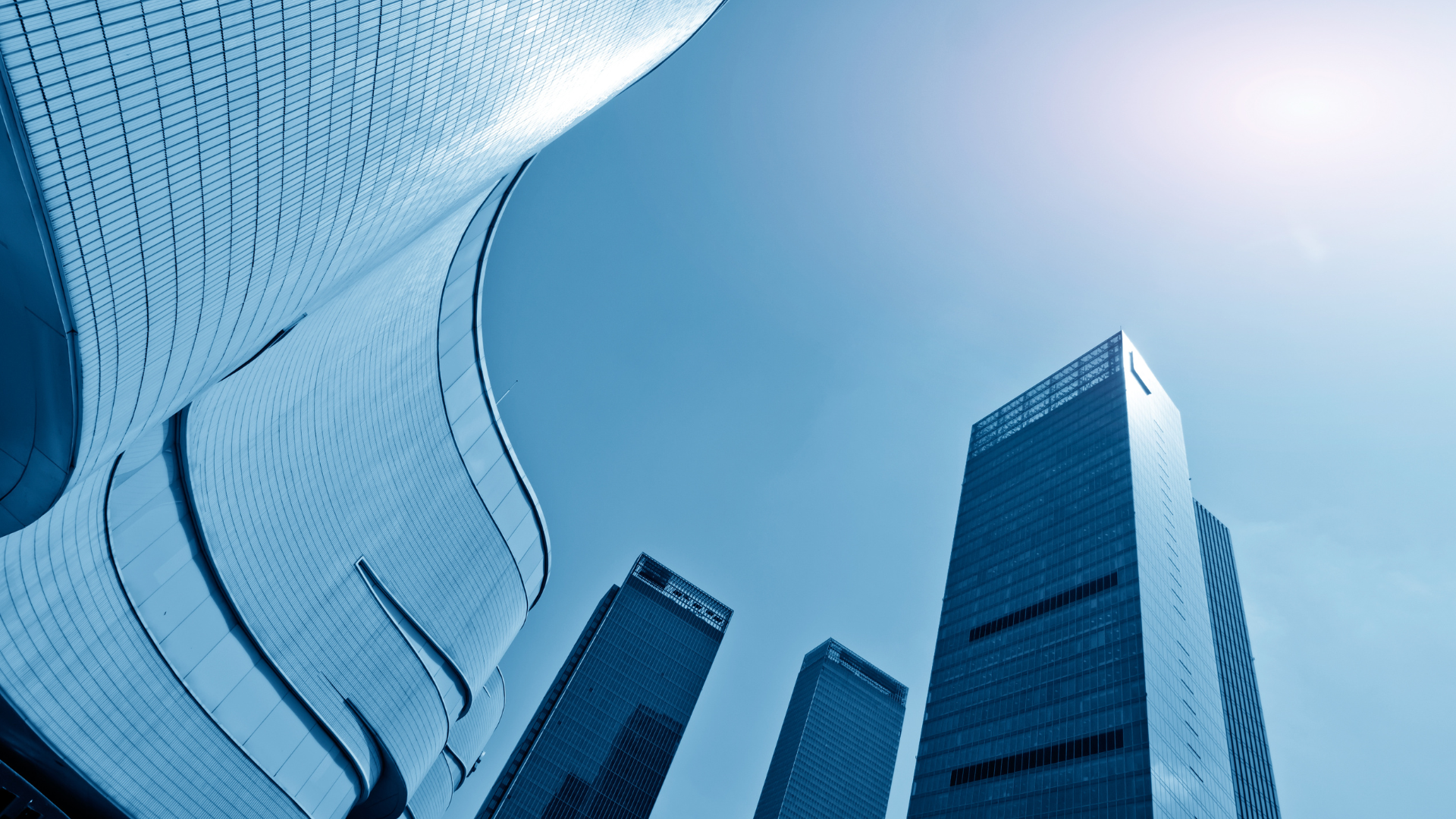 Upward view of city financial district skyscrapers